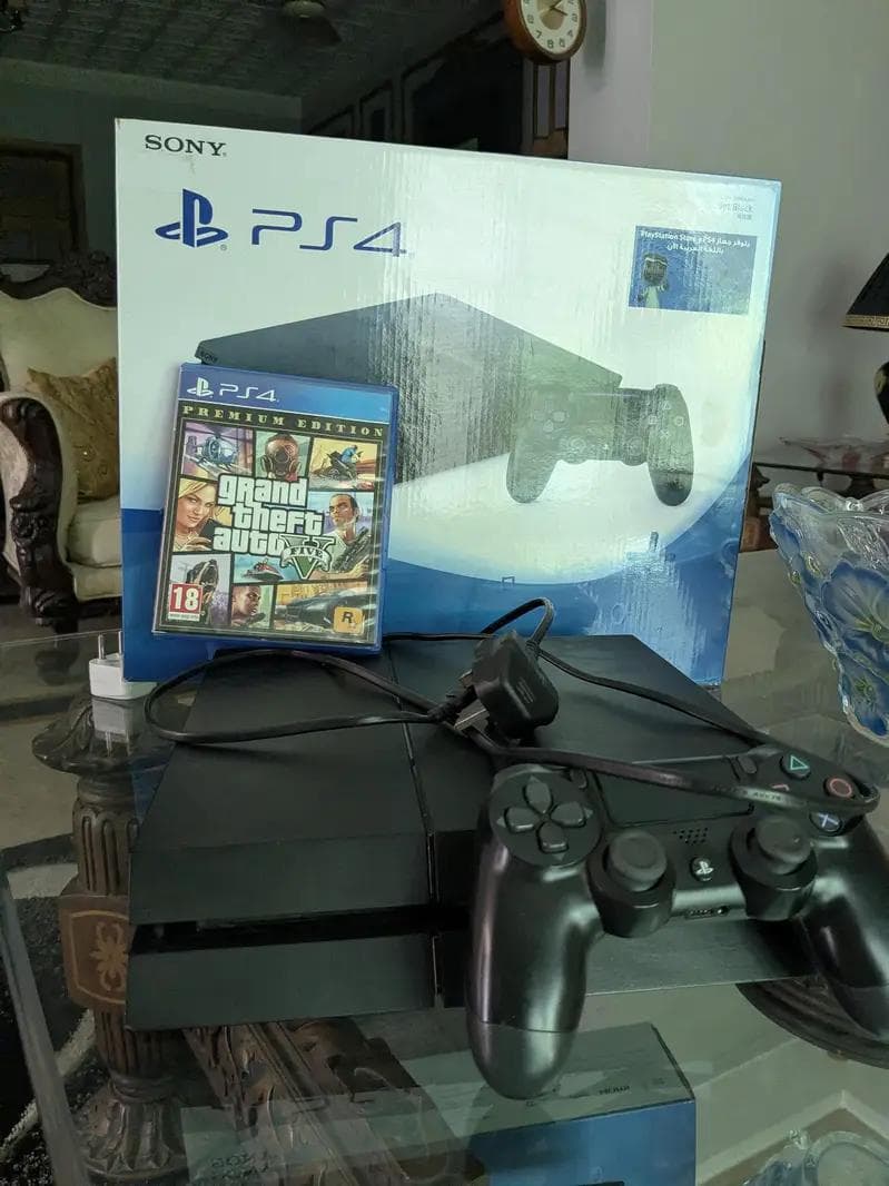 PlayStation 4 1TB with GTA V exact unit photo 1